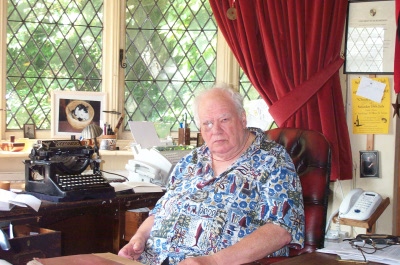 Sir Patrick Moore in his study